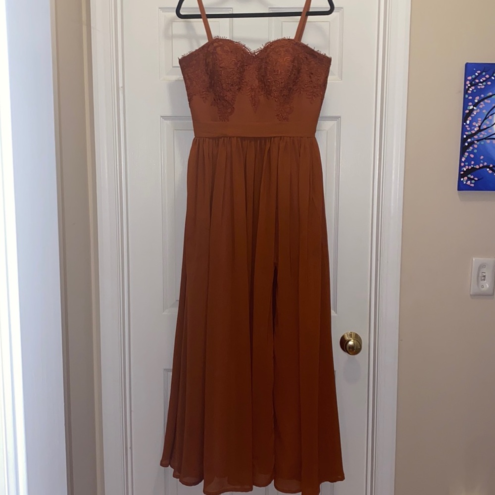 Beautiful burnt orange bridesmaid dress with corset back and slit in front!